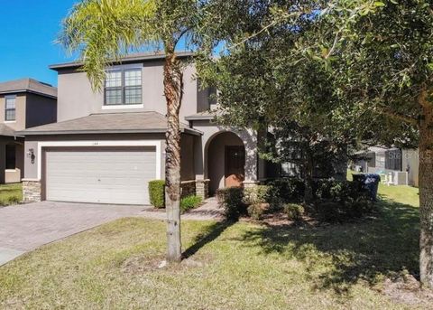 Photo of 1144 Cypress Pointe Boulevard, Davenport, FL 33896 (MLS # S5145636)
