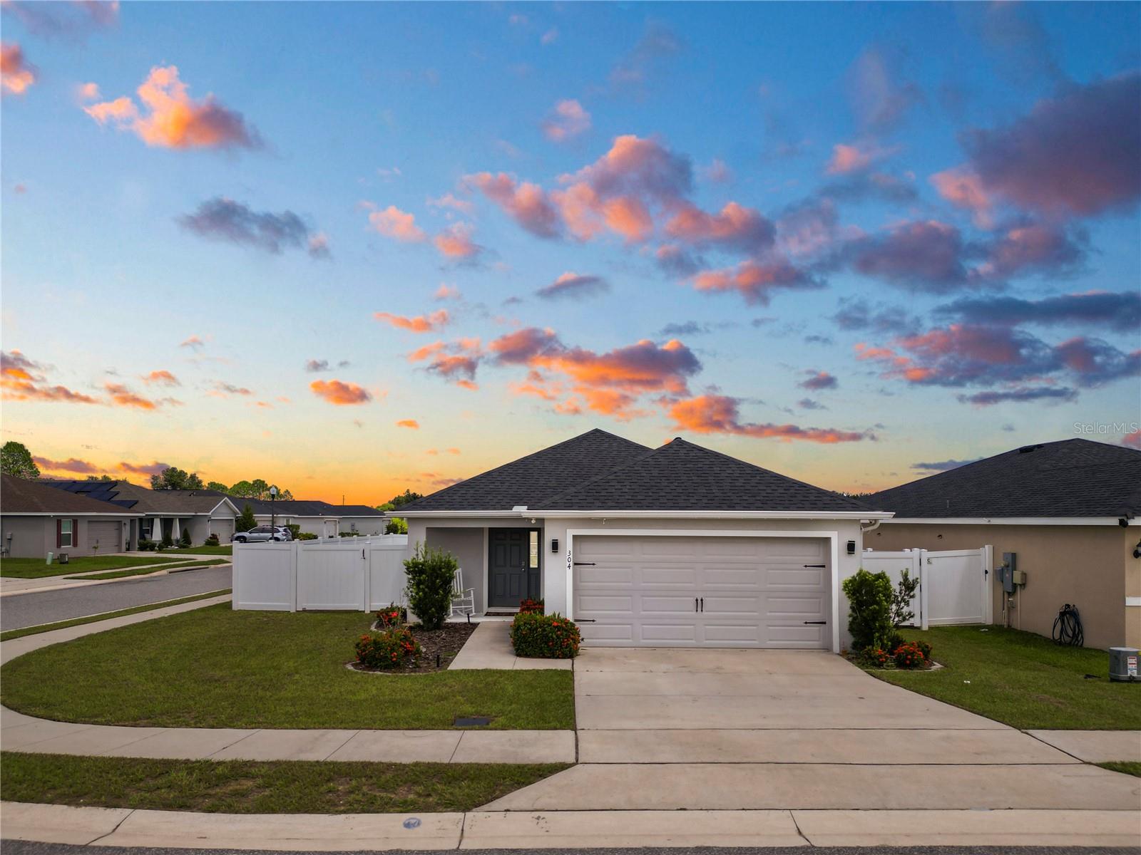 Welcome to this move in ready Amaryllis model by Highland Homes! This beautifully maintained 3-bedroom, 2-bath home sits on a spacious corner lot in a quiet Davenport neighborhood. Step inside to an inviting open-concept layout, where the modern kitchen seamlessly flows into the living and dining areas—perfect for entertaining or everyday living.
Enjoy Florida living year-round from your screened-in porch, and take advantage of the fully fenced backyard with durable vinyl fencing, offering privacy and space to relax or play. The home also includes a 2-car garage for added convenience and storage.
With its stylish design, quality construction, and move-in ready condition, this popular Amaryllis model is ready to welcome you home. Schedule your private tour today!