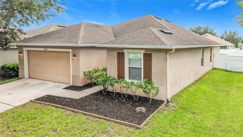 Photo of 12944 Boggy Pointe Drive, Orlando, FL 32824 (MLS # O6437095)