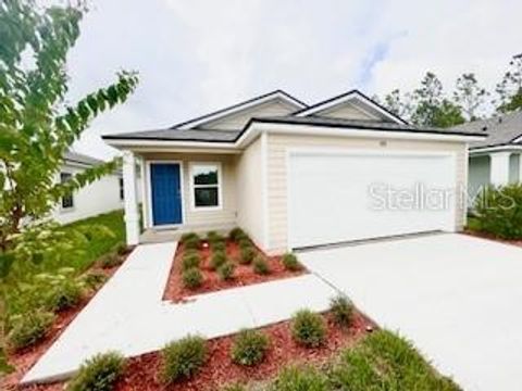 Photo of 870 Grand Reserve Drive, Bunnell, FL 32110 (MLS # FC312160) Photo of 870 Grand Reserve Drive, Bunnell, FL 32110 (MLS # FC312160)