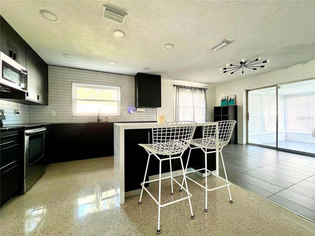 Photo of 1945 68th Avenue S, St Petersburg, FL 33712 (MLS # TB8452413)