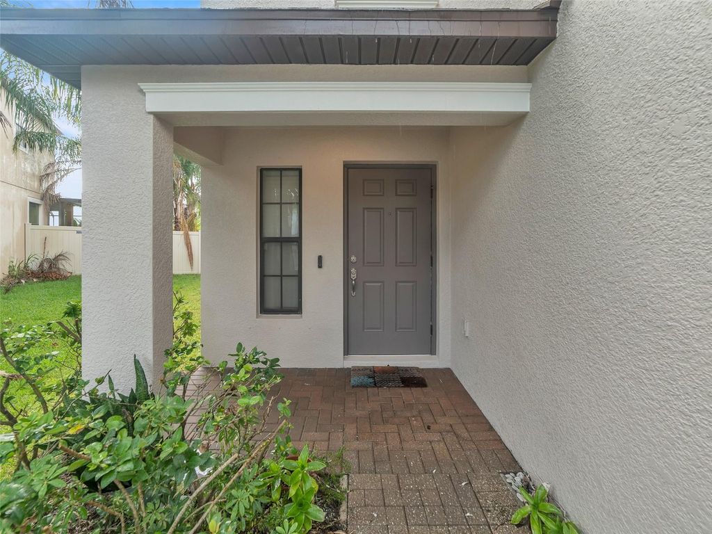 Photo of 10043 Newminster Loop, Ruskin, FL 33573 (MLS # TB8436721)
