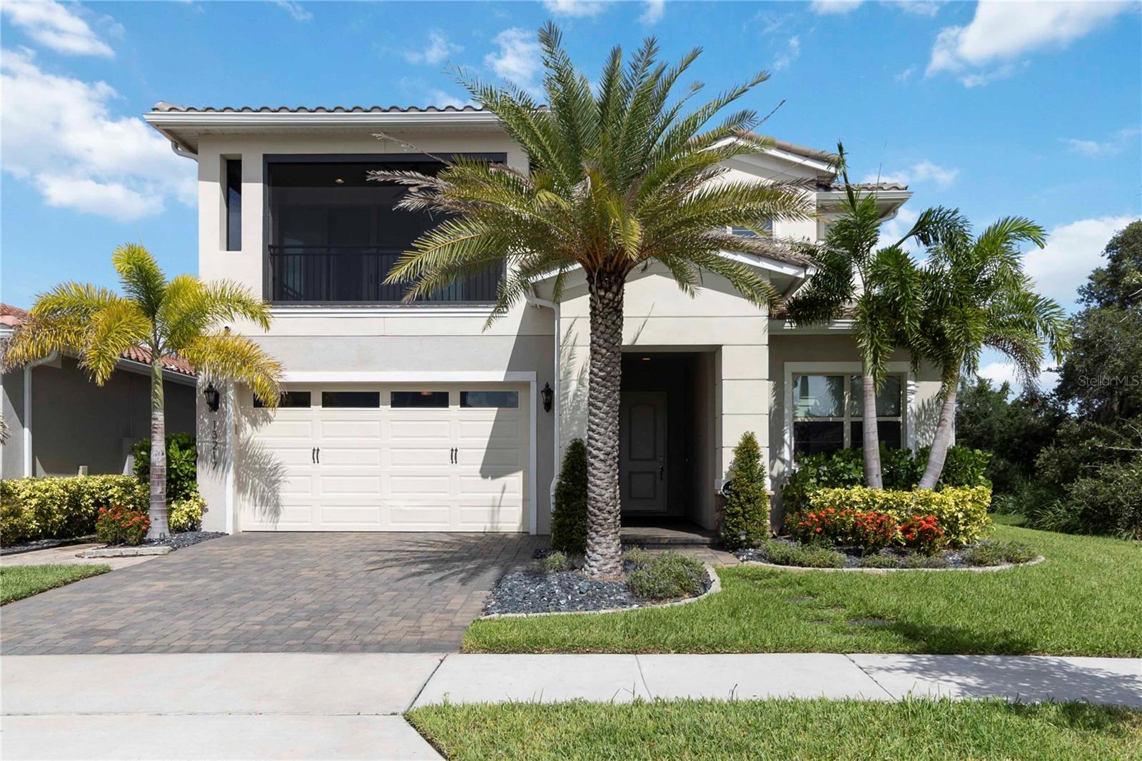 Welcome to 13217 Bromborough Drive, a beautifully upgraded retreat located in the exclusive, guard-gated community of Eagle Creek in Lake Nona. This exquisite residence has been meticulously enhanced with high-end finishes and luxury upgrades, offering resort-style living right at home. With 5 bedrooms and 5.5 bathrooms (including a suite on the first floor), you will step inside to discover a spacious open floor plan filled with natural light, elegant flooring, and refined architectural details throughout. The gourmet kitchen is a chef’s dream, featuring premium cabinetry, quartz countertops, two oversized islands, a designer backsplash, and top-of-the-line stainless steel appliances, as well as an electric blind system and a premium wine fridge. Perfectly designed for both entertaining and everyday living, the expansive living and dining areas open seamlessly to the home’s breathtaking outdoor oasis. Situated on a premium lot with no neighbors in the back or on the right side of the house, this home offers enhanced privacy and uninterrupted views of the surrounding landscape. The highlight of this home is the brand-new, custom-designed luxury pool and spa, where you can unwind in style, surrounded by tropical landscaping and serene ambiance. The fully equipped outdoor kitchen and grill station takes entertaining to the next level—ideal for weekend gatherings or quiet evenings under the stars. Additional features include spacious bedrooms, a luxurious primary suite with a spa-inspired bath, and modernized bathrooms with elevated finishes. This home also features a covered lanai, a fenced backyard, and a two-car garage with ample storage space. Located in one of Orlando’s most desirable communities, you’ll enjoy top-rated schools, championship golf, clubhouse amenities, tennis courts, fitness center, playgrounds, and a resort-style pool—all just minutes from Lake Nona’s Medical City, shopping, dining, and major highways. Don’t miss this rare opportunity to own a move-in-ready, luxury pool home in the heart of Lake Nona! Schedule your private showing today. Enjoy the available 3D tour and the aerial video!!!