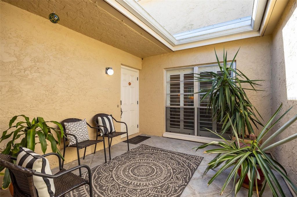 Photo of 1597 Amberlea Dr S #1597, Dunedin, FL 34698 (MLS # TB8496872)