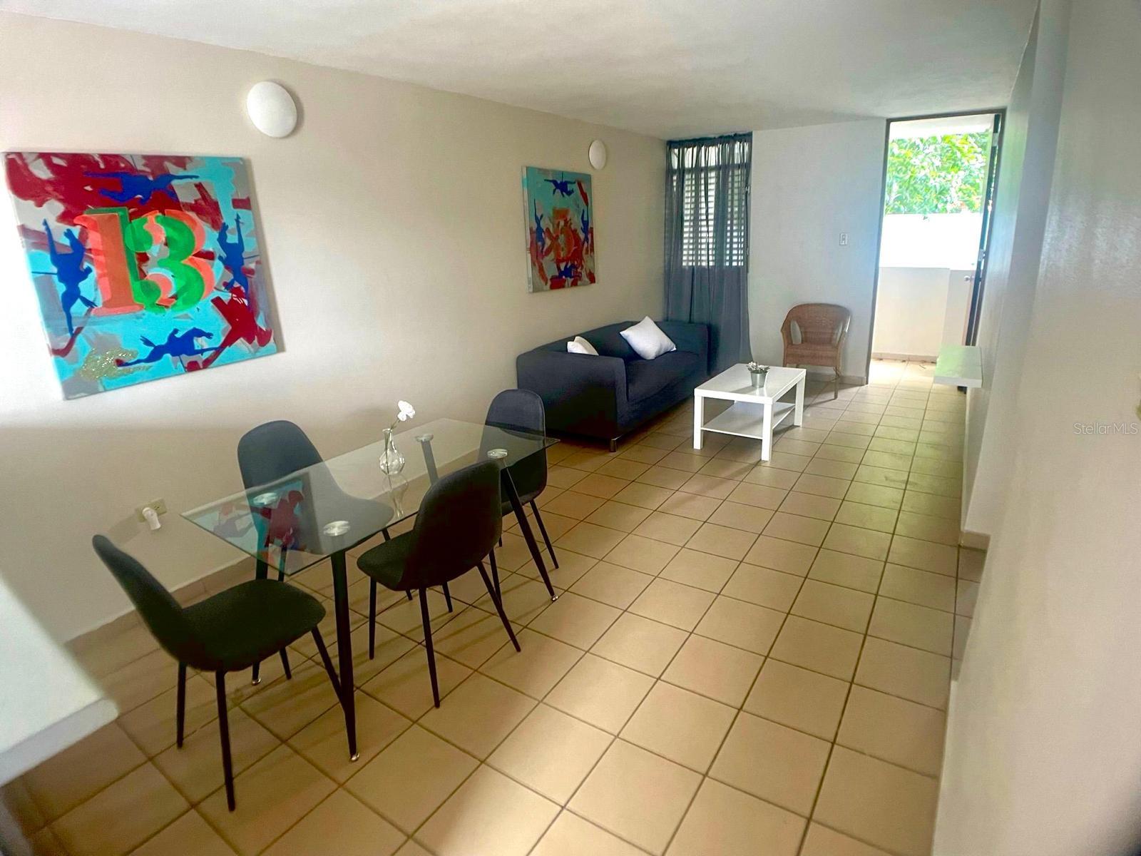 In Ponce, apartment 103 at the Antonsantti Building is available for rent starting October 1st. This fully furnished and equipped property offers two bedrooms, one bathroom, assigned parking, and controlled access, providing a safe and comfortable environment. It includes beds with nightstands, two air conditioning units, a ceiling fan in the kitchen, living room set, dining set for four, stove, refrigerator, and washer/dryer combo. Conveniently located just minutes from the Law School and only seven minutes from Ponce Health and Science University, this apartment is ideal, with an excellent location close to supermarkets, hospitals, and medical offices. The building features a security camera system and is situated in a quiet residential area. The rental price includes maintenance.