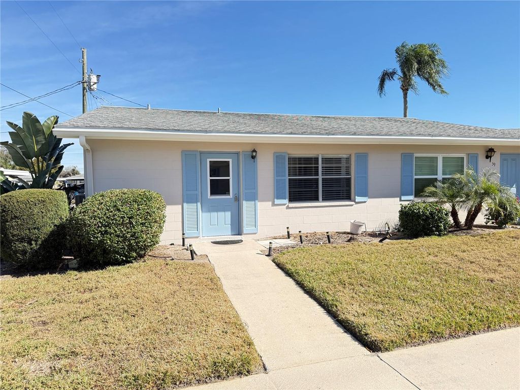 Photo of 402 Dorchester Place #40, Sun City Center, FL 33573 (MLS # TB8466768)