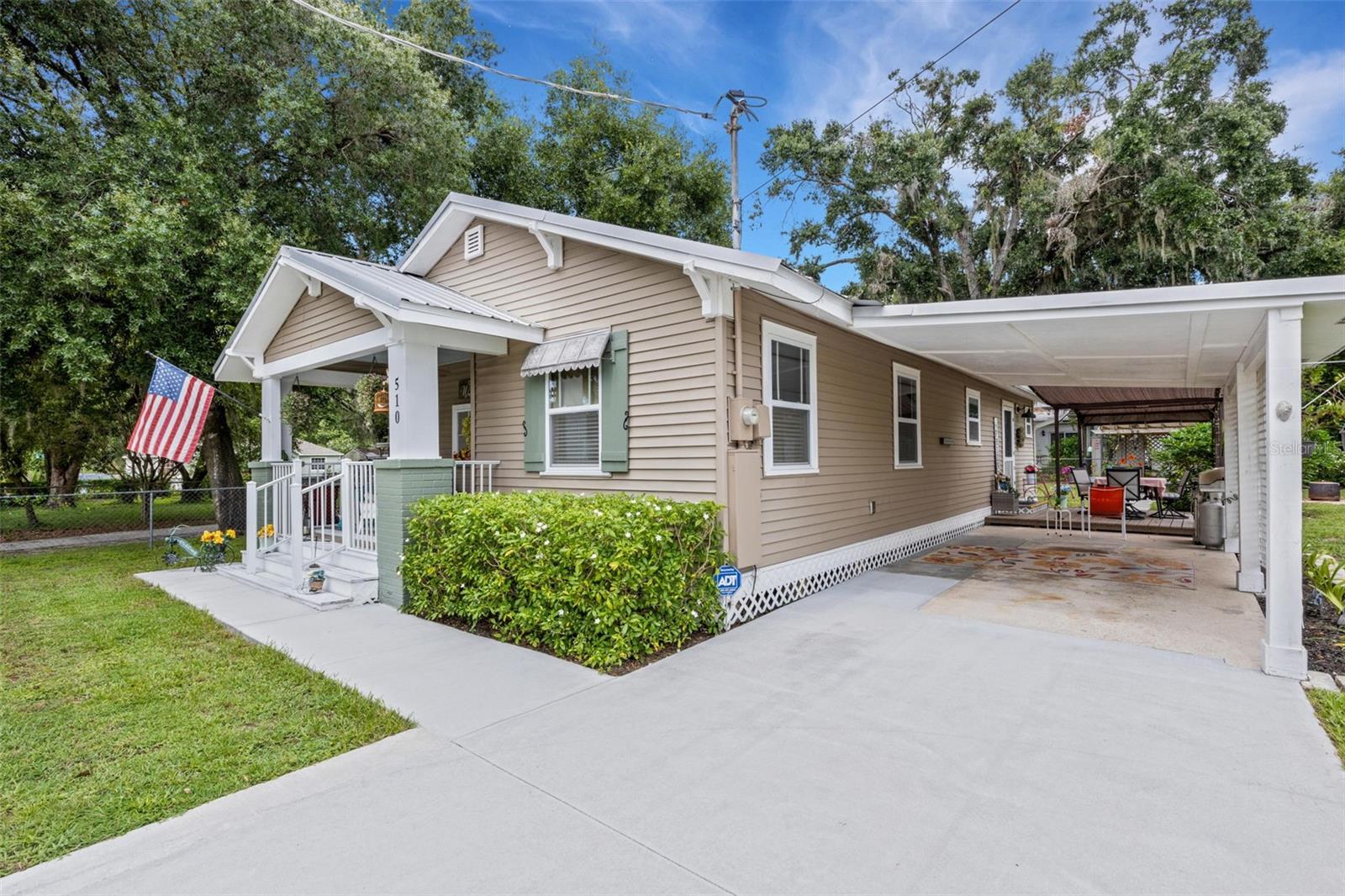 If you are looking for a MOVE IN READY home in Plant City's Historic District, This is the home of you!!! This BEAUTIFUL 3 bedroom 2 bath Home has all updated wiring and plumbing, along with complete remodel of both baths, kitchen and bedrooms and new AC. Upgraded Counter Tops, Farm Sink, New Cabinets, Pantry, Inside Laundry, Updated Lighting. This is a 1950's Bungalow that has had a complete remodel. You can enjoy the benefits and convenience of The Historic District, without worrying about the time and expense of making repairs. Once you step outside onto the covered deck, a whole world of possibilities' open up with the huge yard (lot is 105' X 104') with a 24'x24' concrete block detached Garage/Work Shop. You have multiple options for Relaxing and/or entertaining guests and outdoor cooking. The yard is fenced and landscaped with a variety of fruit and flowering trees. This home is a must see, so CALL TODAY to schedule your personal tour of this charming home. Thanks