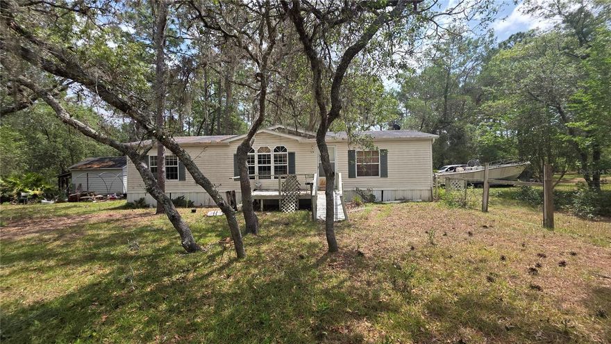 Nestled on a generous 2.65-acre lot, this 3-bedroom, 2-bath home offers a balance of space and potential. With approximately 1,400 square feet of living area, you'll enjoy a peaceful setting in a sought-after area. Whether you're looking for a homestead or a quiet retreat, this property invites you to make it your own.