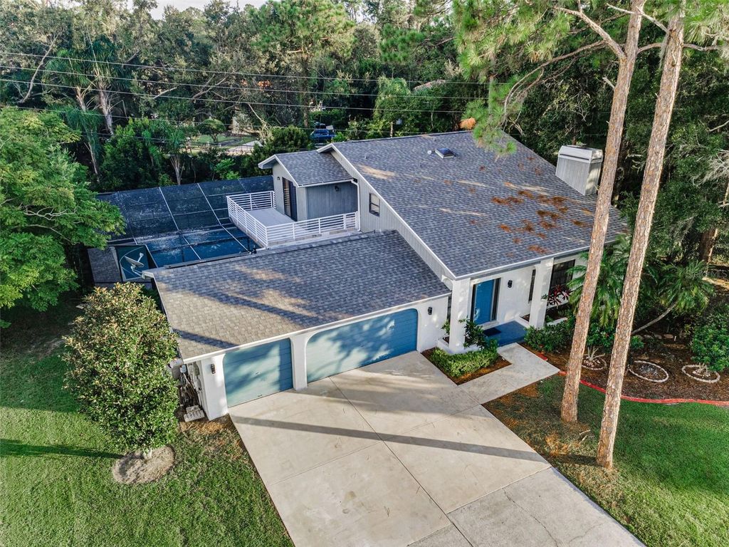 Photo of 3130 Tarpon Woods Boulevard, Palm Harbor, FL 34685 (MLS # TB8416881)