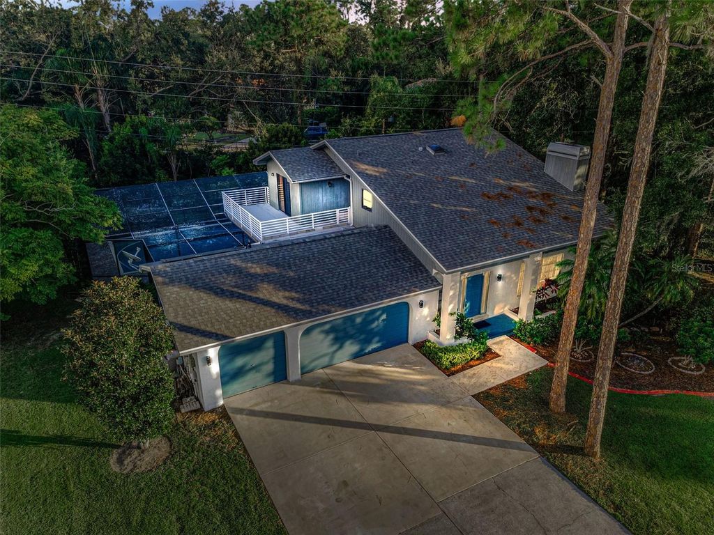Photo of 3130 Tarpon Woods Boulevard, Palm Harbor, FL 34685 (MLS # TB8416881)