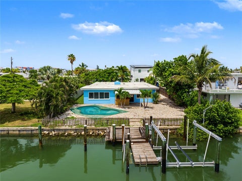 Photo of 403 Normandy Road, Madeira Beach, FL 33708 (MLS # TB8537270)