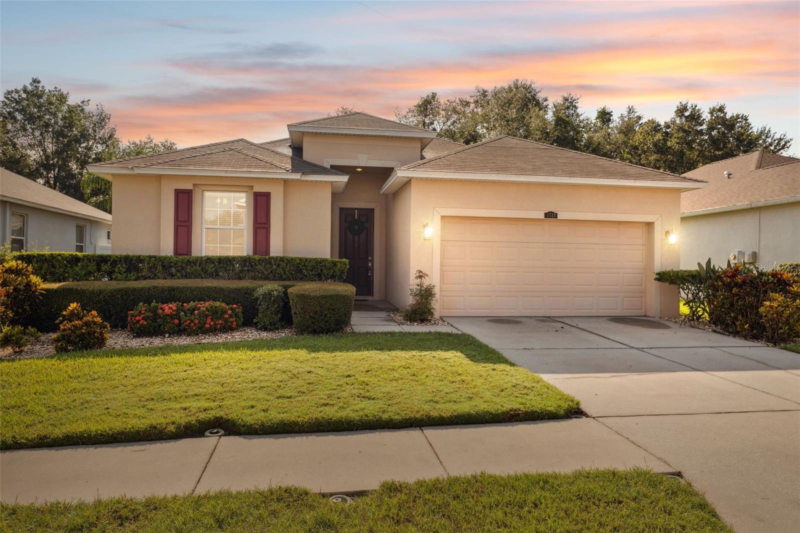 Welcome to 3720 Grecko Dr – a beautifully maintained 3-bedroom, 2-bath home with a spacious 2-car garage, located in one of Wesley Chapel’s most desirable and fast-growing areas of Pasco County. Just minutes from the Tampa Premium Outlets, dining, hospitals, and I-75, this home offers unbeatable convenience and comfort. Enjoy a well-designed layout featuring separate dining and breakfast areas, a remodeled primary bath, and a laundry room with upper cabinets for added storage. The bright, open living spaces flow into an extended screened lanai, perfect for entertaining or relaxing in your private backyard. The fully fenced yard with white vinyl privacy fencing also includes a shed for extra storage. Additional upgrades include crown molding and a water softener system. Best of all – this home comes with no CDD fees and a low HOA, making it as affordable as it is attractive. Don’t miss your chance to own this move-in ready gem—schedule your private tour today!