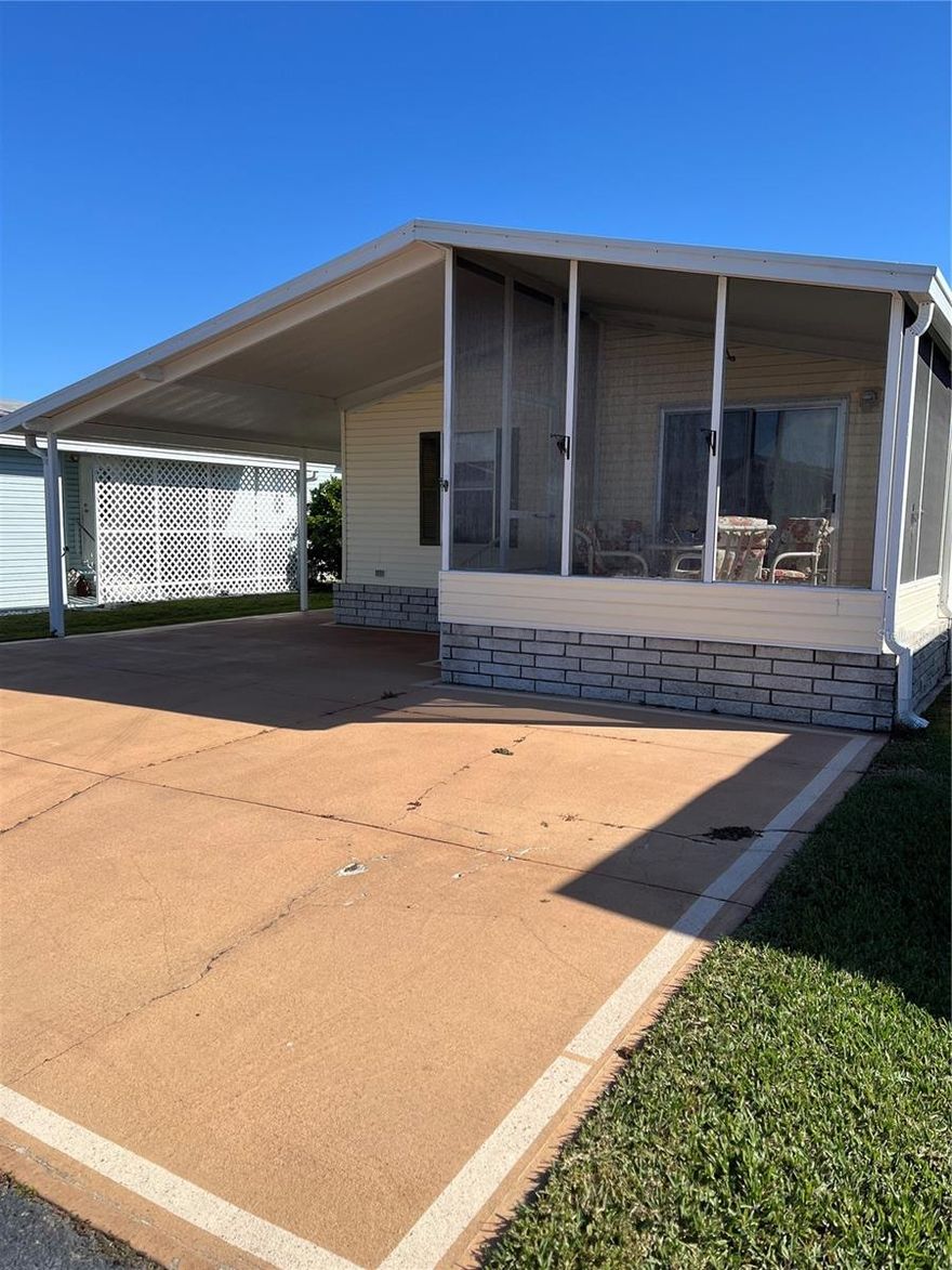 This house is nestled in the sleepy town of Frostproof located in central Florida.  Fully furnished, all contents are included, laundry is in a closet near the kitchen, ceramic tile through-out the main living area, carpet in the bedrooms, front screened lanai, carport and attached golf cart shed. The first thing most people notice is the neat & well-maintained appearance of the community indicating the pride of ownership.  Lily Lake Golf & RV Resort is a 55+ gated community with all the typical amenities, pool, hot tub, shuffleboard, pickle ball/tennis court, corn hole court and bocci ball. The clubhouse is where most of the activities are hosted such as cards, bingo, dinners, dances and numerous other activities and houses a library, billiards room and laundry room. You can be as involved as you like or not at all. We also have a nine-hole executive golf course in the community which is a separate business. The association fee is currently $206 per month, collected twice a year and includes basic cable, internet, lawn mowed & trimmed and the removal of garbage. Great place to retire, almost exactly in the middle of the state. So, bring your sunglasses down and enjoy all the sunshine!