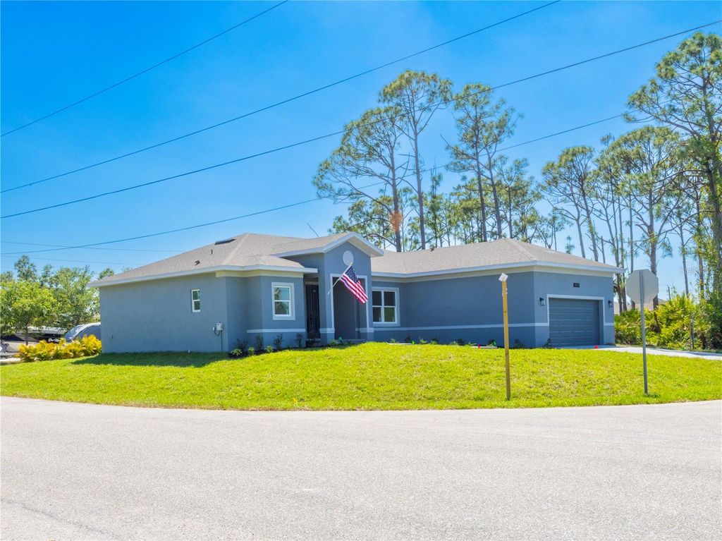 Photo of 14073 Naylor Avenue, Port Charlotte, FL 33981 (MLS # O6319319)