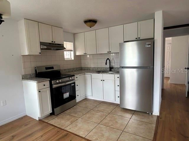 Photo of 419 N 8th Street, Haines City, FL 33844 (MLS # TB8545566)