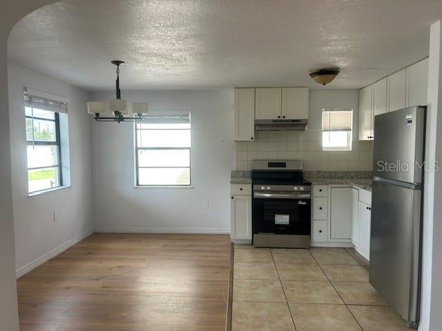 Photo of 419 N 8th Street, Haines City, FL 33844 (MLS # TB8545566)