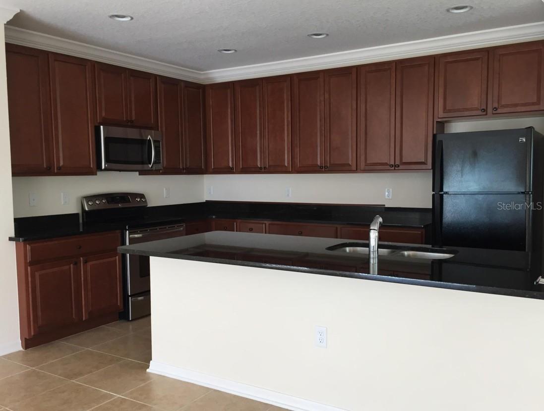 3938 SUNSET COVE DRIVE