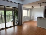 Photo of 5926 Peregrine Avenue #A13, Orlando, FL 32819 (MLS # O6444408)