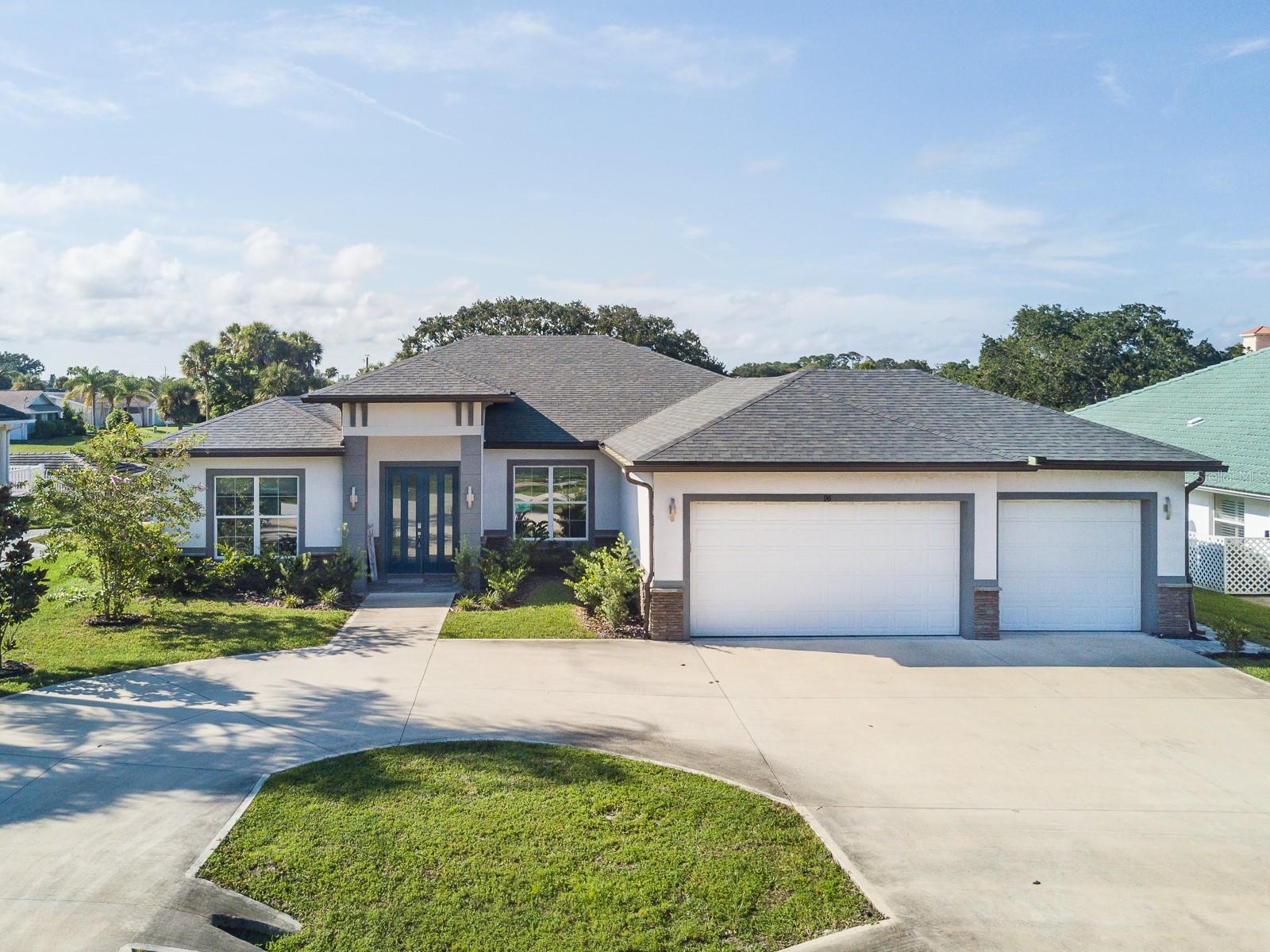 Waterfront living on a Palm Coast's "Club House Waterway" canal, only 2000' from Intercoastal waterway. Featuring a screened lanai, in-ground pool, and private dock with boat lift. Open 3BR/3BA plan plus a den/flex room used as a non-conforming 4th bedroom. The kitchen centers on a gorgeous waterfall-edge island with modern appliances and ample storage. The primary suite faces the water; two additional bedrooms and full baths offer great guest/work options. Step out to a covered patio with wet bar, TV sitting area, and space for an outdoor dining table. Launch kayaks or head out by boat from your backyard. Furniture negotiable. Successful short-term rental history (ask for details). Minutes to parks, golf, shops, restaurants, and the beach.