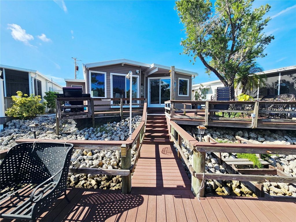 Photo of 55 N Starboard Drive, Venice, FL 34285 (MLS # N6140276)
