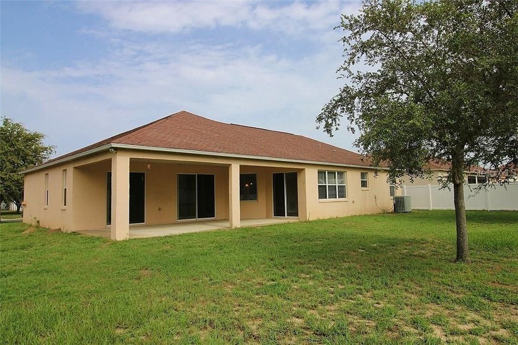 Photo of 36310 Cavalier Ct, Grand Island, FL 32735 (MLS # G5099747)