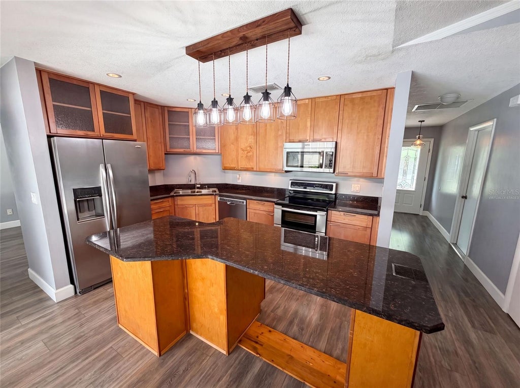 Photo of 4830 Dunbarton Drive, Orlando, FL 32817 (MLS # O6430317)
