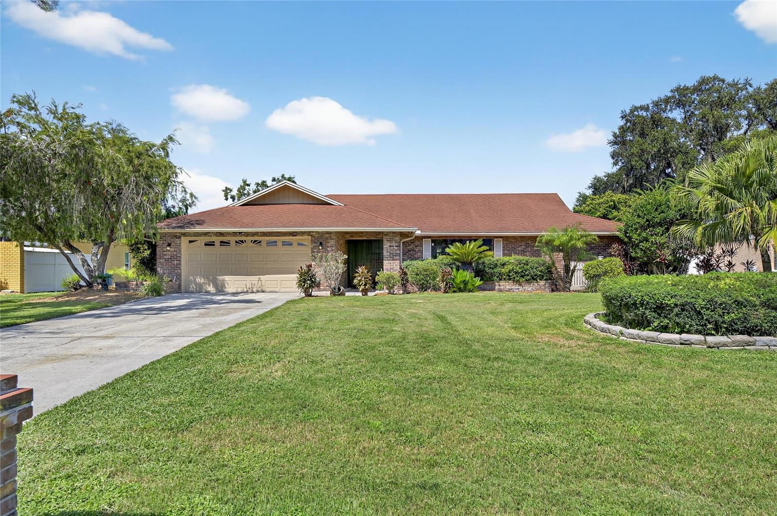 Welcome to your move-in-ready dream home! This stunning 3-bedroom, 2-bathroom upgraded residence is a true masterpiece located in the Walden Lake Fairway Estates Community, in the Heart of Plant City, FL.
This home offers a luxurious and comfortable living experience with over 2,300 square feet of heated living space, high ceilings, and a cozy fireplace in the family room—perfect for those chilly winter nights in Florida. Meticulously designed, with lots of upgrades, it ensures a lifestyle of elegance and functionality.
As you enter, you'll immediately notice the exquisite flooring that runs through the main living areas, creating a sleek and cohesive look. All bedrooms are adorned with new rugs and freshly painted walls. The open-concept floor plan flows seamlessly from room to room, making it ideal for entertaining and everyday living.
The heart of the home is the master suite, conveniently located on the main level for added privacy and convenience. It boasts ample space and large windows that fill the room with natural light. The luxurious en-suite bathroom features top-of-the-line fixtures, a walk-in shower, a free standing soaking tub, dual sinks, and two spacious walk-in closets—your private retreat.
The spacious living area is perfect for hosting gatherings, while the gourmet kitchen is a chef's delight. It includes modern appliances, custom cabinetry, a large sink, a stylish backsplash, quartz countertops, and a large island with a breakfast bar. Whether you’re preparing a quick breakfast or a gourmet dinner, this kitchen has everything you need.
The property also includes a 2-car garage, providing ample space for vehicles and storage, complemented by a spacious driveway.
Situated on a well-sized lot, you'll enjoy a tranquil view of the backyard, providing a private oasis where you can unwind. Whether sipping morning coffee on the patio or relaxing in the serenity of your surroundings, this home accommodates a peaceful lifestyle. Additional enhancements include stylish lighting fixtures and ceiling fans.
Don’t miss the chance to view this upgraded 3-bedroom, 2-bathroom home with an office area. It is truly a rare gem that combines luxury, space, and modern amenities while offering breathtaking views and unparalleled comfort.
This magnificent home is conveniently located with easy access to I-75 and Tampa highways. It is just a short drive to the Hard Rock Hotel and the Florida State Fairgrounds, and only 60 minutes from Florida's top vacation destinations, including Busch Gardens in Tampa, Orlando, Disney World, and our beautiful Gulf beaches.
This opportunity is too good to pass up! Schedule your private tour today!