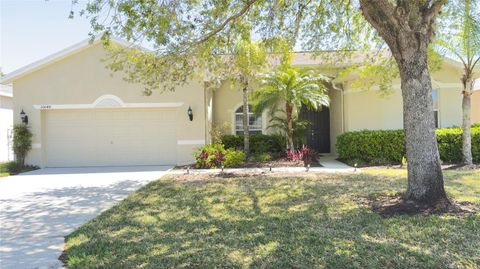 Photo of 10048 Cleghorn Drive, San Antonio, FL 33576 (MLS # TB8364923)