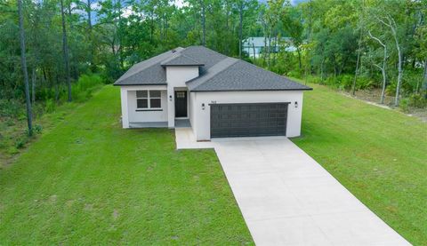 Photo of 968 W Hampshire Boulevard, Citrus Springs, FL 34434 (MLS # TB8430401)