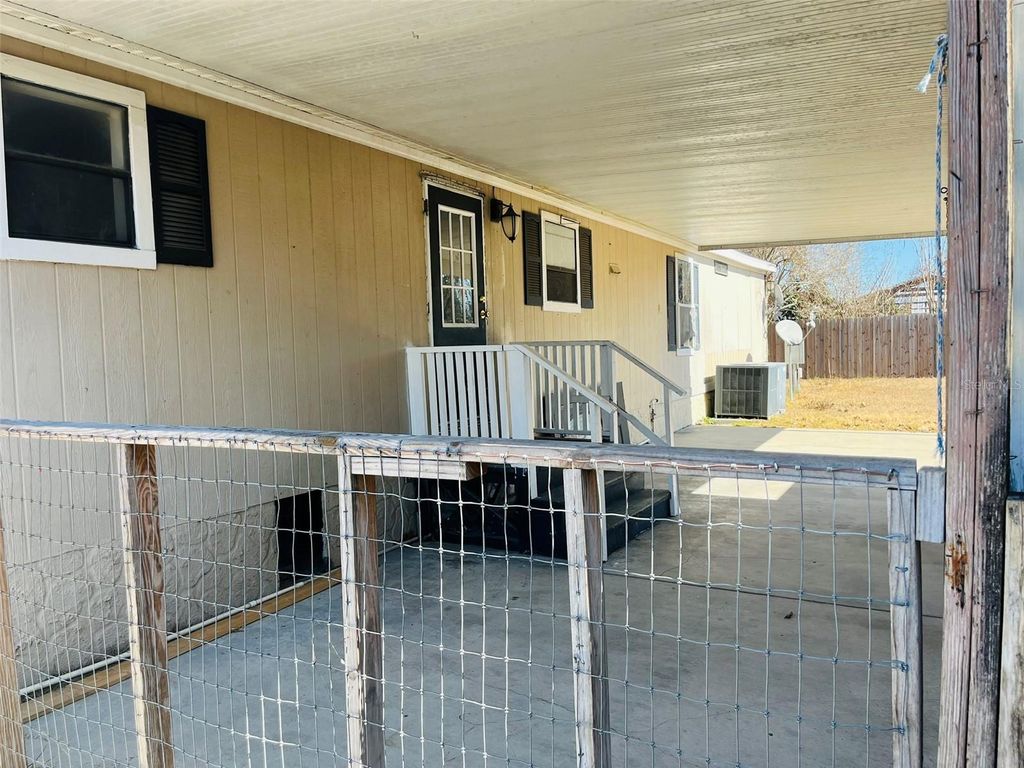 Photo of 9300 SE 119th Street, Belleview, FL 34420 (MLS # O6380311)