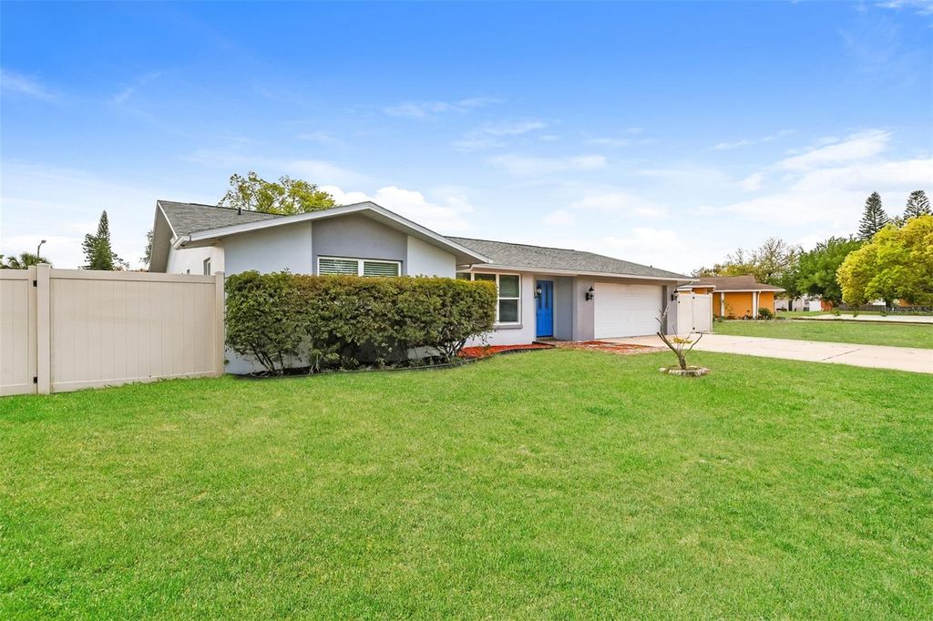 Photo of 8330 Broken Willow Lane, Port Richey, FL 34668 (MLS # O6397657)