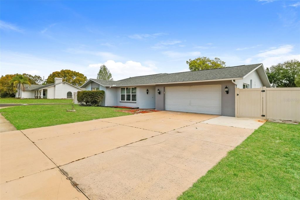 Photo of 8330 Broken Willow Lane, Port Richey, FL 34668 (MLS # O6397657)