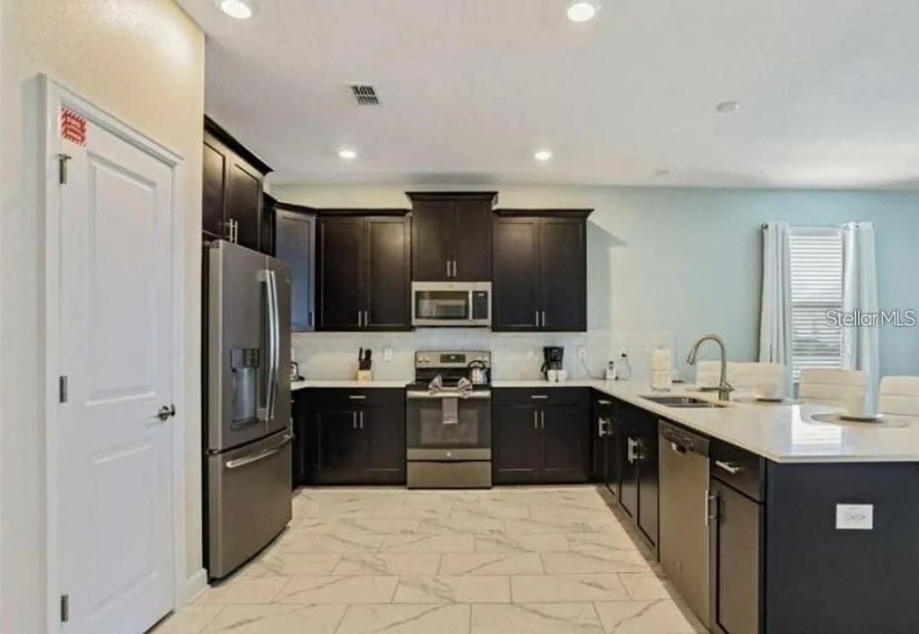 Photo of 1575 Plunker Drive, Davenport, FL 33896 (MLS # O6399707)