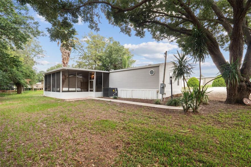 LOCATION, LOCATION, LOCATION! Don't miss your opportunity to own this Doublewide Mobile Home minutes from The Villages Mulberry Plaza. It is conveniently located in Summerfield which is between Ocala, Weirsdale and The Villages for Entertainment, Shopping Plaza's, and School options, less then 2 hours from either coast. This 3/2 Manufactured home sits on your own land with NO LOT RENT NO HOA FEES. It has a Remodeled kitchen that was done in 2019. Built in 1999 with an added screened-in lanai plus concrete pad extended for grilling and extra entertainment space. Great for First time Homeowners. Vinyl Flooring in kitchen, laundry and dining rooms. New Appliance's 2019, New Washer and Dryer, New Hot water heater, New Air conditioning Unit, New Carpet, Newer back steps that were replaced in 2020 and a 8x10 Storage Shed. **4 POINT INSPECTION RECENTLY PASSED. SEPTIC RECENTLY INSPECTED AND PASSED** INSPECTION. Quiet neighborhood. Get Ready, to make it your very own, Home Sweet Home. Buyer must verify all Measurements as they are approximates and should not be relied upon. For offer submission, follow the Offer Instructions uploaded in the Attachments. I will Provide a 4 point inspection upon request.