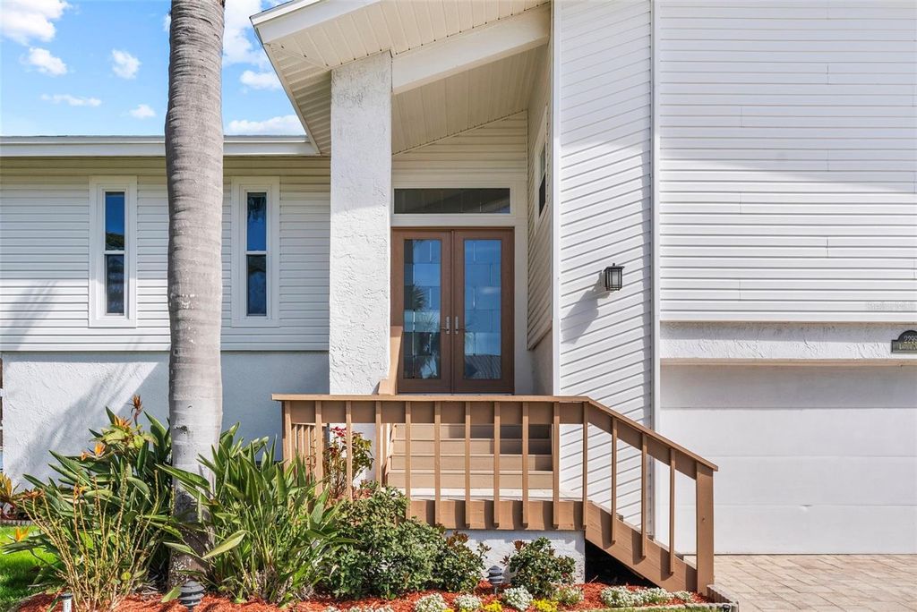 Photo of 2299 Lagoon Drive, Dunedin, FL 34698 (MLS # TB8474932)