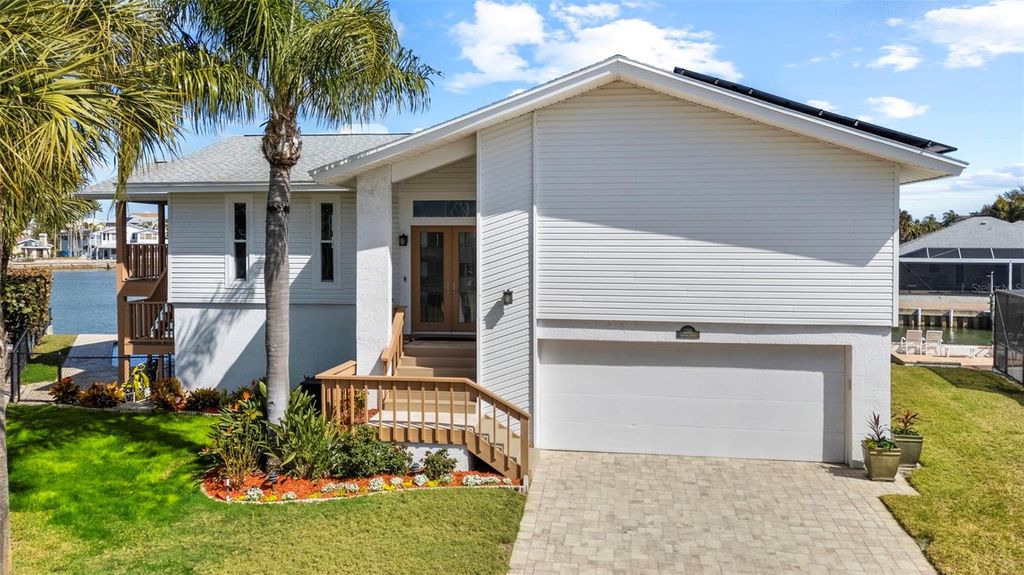 Photo of 2299 Lagoon Drive, Dunedin, FL 34698 (MLS # TB8474932)