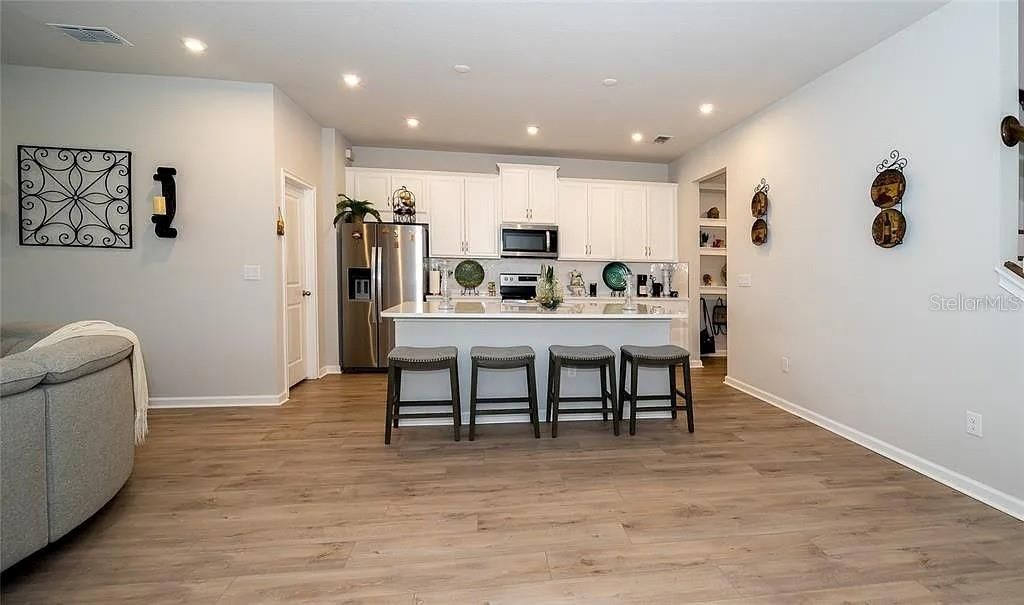 Photo of 26082 Woven Wicker Bend, Lutz, FL 33559 (MLS # TB8464882)