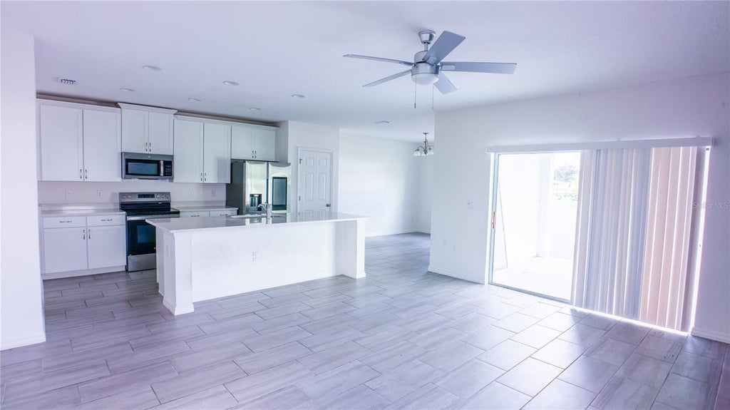 Photo of 1062 Sand Torch Circle, Davenport, FL 33837 (MLS # O6449719)