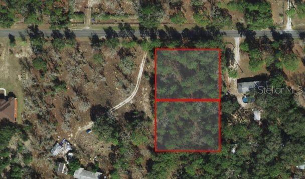 Welcome to your opportunity to own two parcels totaling 0.98 acres of vacant land in a serene and quiet area. This expansive property offers the perfect canvas for your dreams, whether you're seeking a quite retreat, an investment opportunity, or a place to build your dream home.
