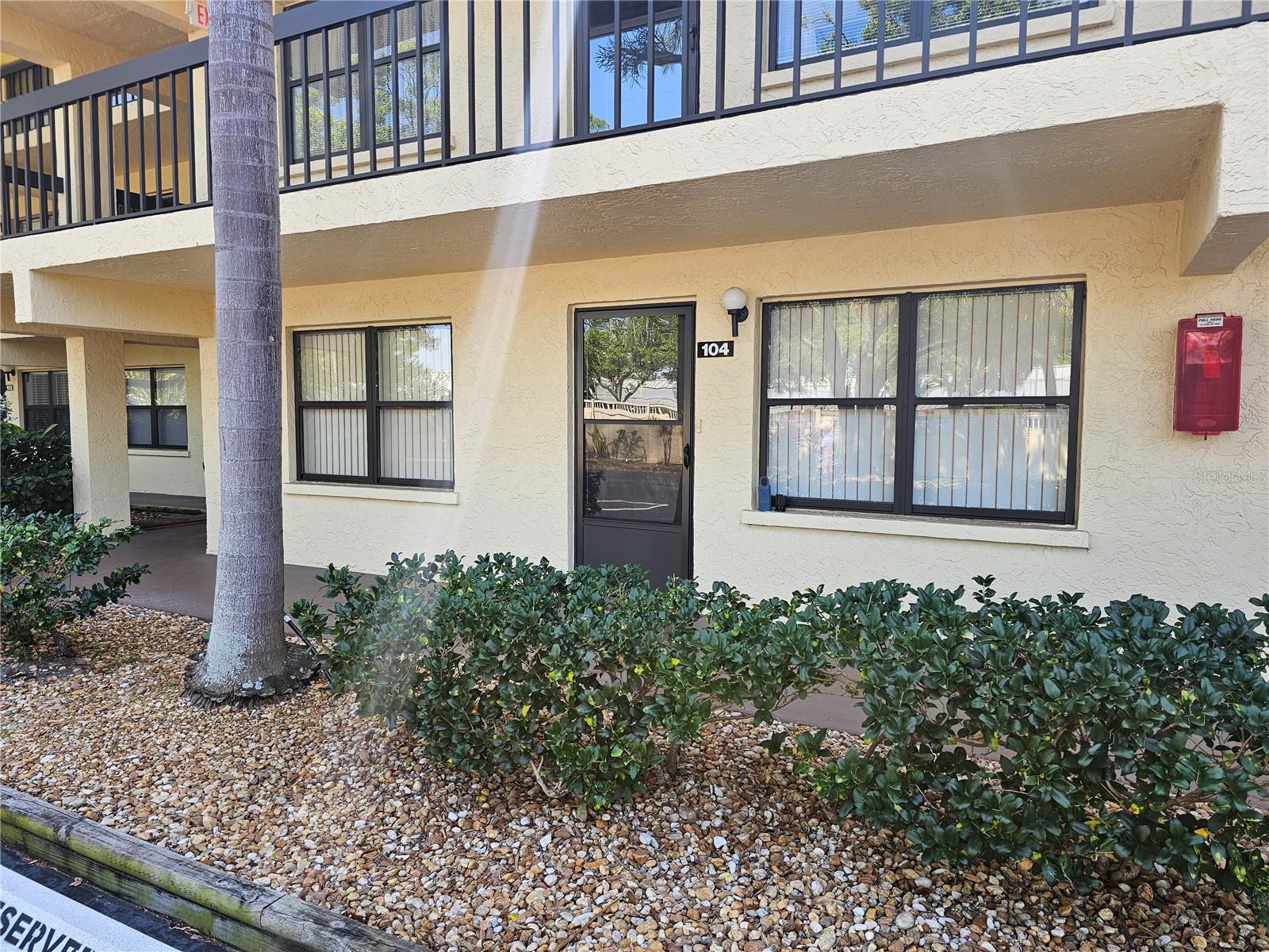 Charming first floor turnkey furnished condominium in a beautiful park-like setting with views of lake and fountain from the screened lanai. Spend your days and evenings enjoying the wildlife and the tranquil landscaped courtyard and lake with gazebo and grills and spacious common areas. Assigned parking directly in front of the unit. Vinyl tile throughout the living areas and carpeted bedrooms. Large kitchen with lots of countertop space and room for 2 chefs. Master bedroom features a large walk-in closet and private bath. Secured storage area and laundry room on the same floor as the condo. The community features gated security, a clubhouse with a fitness center, pickleball courts, shuffleboard, and a large heated pool for your enjoyment. Located close to shopping and restaurants and easy access to the beautiful beaches of Anna Maria Island!