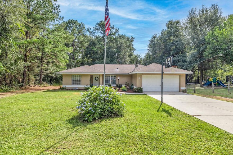 Welcome to your future home sweet home! This delightful 3-bedroom, 2-bathroom property is a perfect blend of comfort, functionality, and outdoor serenity. Located just 5 minutes away from the picturesque Moss Bluff, where you can fulfill all your boating and fishing desires, and a short drive to The Villages for shopping, dining, and endless amenities, this home offers a fantastic lifestyle for its lucky new owners.

Key Features:



1. Screened Back Porch: Step into the screened back porch, a tranquil oasis that allows you to enjoy the beautiful Florida weather without the hassle of pesky insects. It's the perfect spot for morning coffee, evening relaxation, or entertaining friends.

2. Whole Home Water Filtration System: Enjoy clean, fresh water throughout your entire home, ensuring you and your loved ones have access to pure, healthy water.

3. Stainless Steel Kitchen Appliances: The modern kitchen features stainless steel appliances, offering a sleek and efficient space for all your culinary creations.

4. Workshop with Electricity: A 12x16 workshop with electricity is a handy addition for DIY enthusiasts, artists, or anyone in need of a versatile workspace.

5. Fenced Yard with Garden: The fully fenced yard not only ensures privacy but also includes a designated garden area for green thumbs to cultivate their own fresh produce.

6. Security System: For added peace of mind, a security system is already in place.

7. Recent Septic Pumping: The septic system was professionally pumped in September 2023, ensuring optimal functionality.

Don't miss the opportunity to make this charming property your new home. Embrace the tranquility of Moss Bluff and the convenience of The Villages, and experience the best of Florida living.

Schedule a showing today and make this property your own.