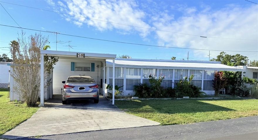 Welcome to Oasis Park, a resident-owned 55+ community with no lot rent—your ownership includes your own share in the community. Enjoy a low monthly HOA and a fantastic location close to dining, shopping, and everyday conveniences. Whether you’re a seasonal resident or looking to live here full-time, this home offers comfort and convenience.

Located within close proximity to Largo Mall and just a short drive to Indian Rocks Beach, you’ll love how easy it is to enjoy all the area has to offer.



Step inside and you’ll appreciate the open layout with a spacious living room and kitchen. There is also a bonus room just off the living area—perfect for a home office, reading nook, or hobby space. A half bathroom is conveniently located off the bonus room. The full bathroom is situated right next to the bedroom for added privacy and ease.

The fully enclosed front porch is tiled and includes a washer and dryer hook up, offering additional usable living space. Outside, you’ll find two storage sheds near the carport—ideal for tools, beach gear, or holiday décor. The covered carport provides protection from the Florida sun and rain.

Enjoy relaxed Florida living in a friendly community where you actually own a share of the park!