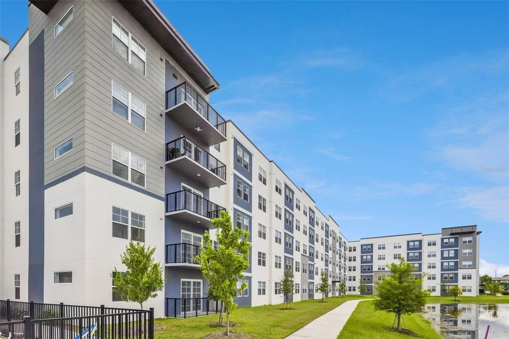 Photo of 5587 Millenia Park Boulevard #203, Orlando, FL 32839 (MLS # O6439817)