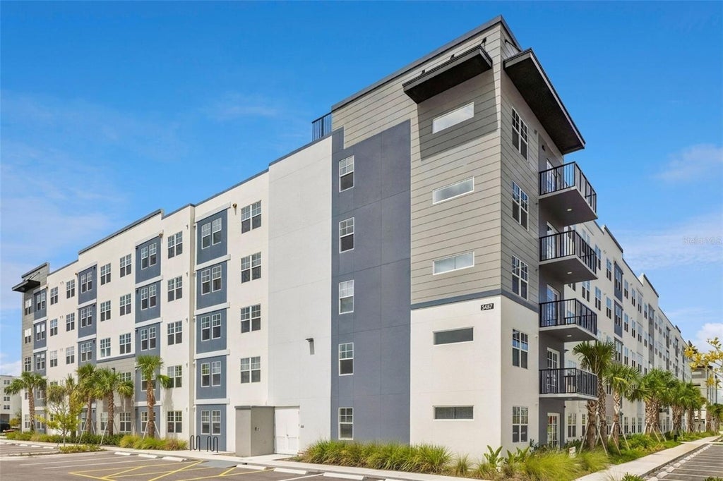 Photo of 5587 Millenia Park Boulevard #203, Orlando, FL 32839 (MLS # O6439817)