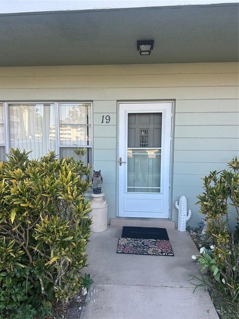 Photo of 2401 Ecuadorian Way #19, Clearwater, FL 33763 (MLS # TB8450224)