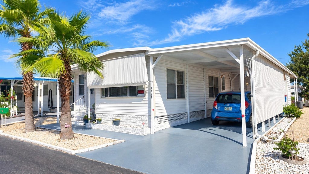 Photo of 3517 Tiki Drive, Holiday, FL 34691 (MLS # TB8553459)