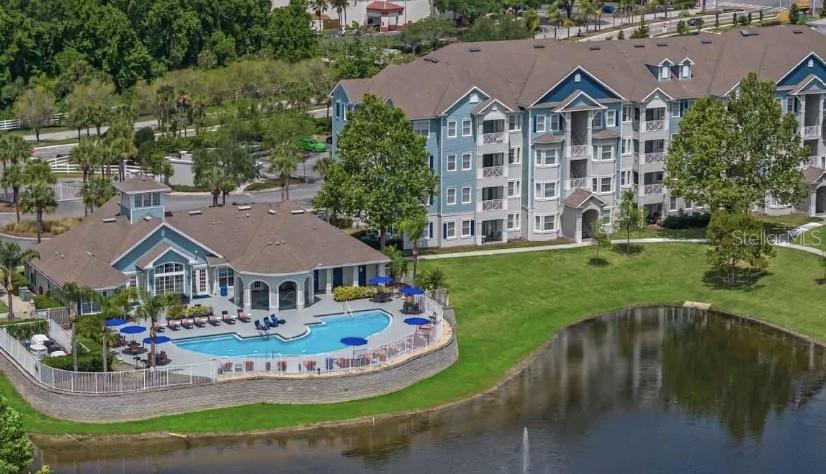 Discover this spacious 2-bedroom, 2-bathroom condo in the exclusive gated Cane Island Resort community in Kissimmee.
The unit features a functional floor plan that begins with a welcoming hallway leading to the kitchen, complete with granite countertops and an open layout that flows seamlessly into the living area. Step out onto your private balcony and enjoy serene views of the pool and pond. The primary bedroom includes a walk-in closet with an additional bonus room, perfect for extra storage or organization.
Additional highlights include a laundry room conveniently located near the kitchen and a versatile bonus room near the entrance that can serve as a home office, ironing room, or extra storage space. The building also offers an elevator for easy accessibility.
Cane Island Resort offers a true resort-style lifestyle, featuring a clubhouse, swimming pool, barbecue area, fitness center, and more. Ideally located just off US-192, the community is minutes from Disney parks, Old Town, supermarkets, and restaurants—providing both comfort and convenience.