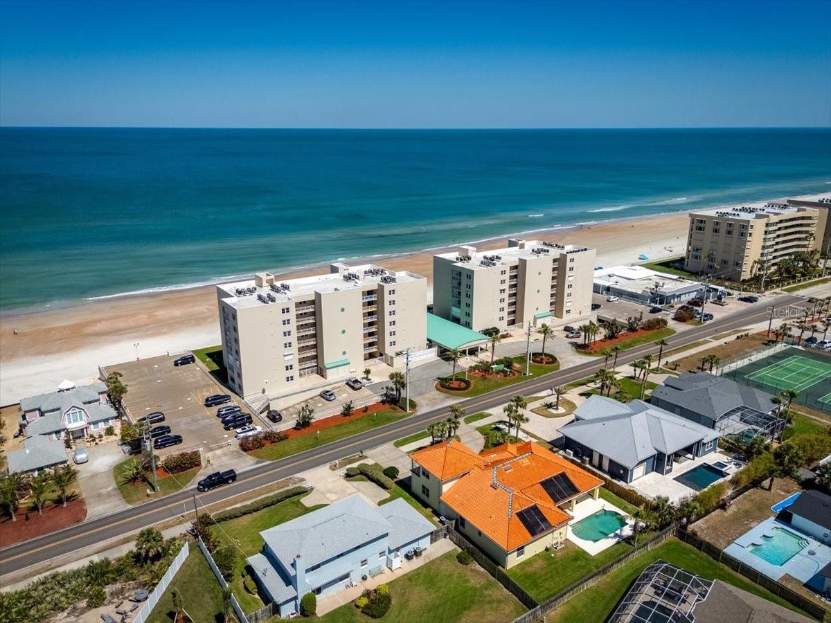 One of the BEST in Ponce Inlet! Coastal Luxury & Unmatched Views Wake up to stunning sunrises over the Atlantic and wind down with gorgeous sunsets over the Intracoastal Waterway—all from your beautifully renovated Ponce Inlet condo, located on a pristine No-Drive Beach! This fully updated unit is truly move-in ready and packed with upgrades: * Brand new tile flooring throughout *Fresh interior paint and elegant crown molding * New fans, blinds, and lighting fixtures * In-unit washer and dryer for added convenience The kitchen is a chef's dream with: > All new stainless steel appliances > New cabinetry with custom turtle pulls > Gleaming granite countertops Both bathrooms have been fully renovated with: + New tile, cabinetry, granite counters + Stylish new fixtures, toilets, and tiled showers Enjoy turn-key condo living—everything stays! Includes all furnishings, 3 TVs, stylish new furniture, fully stocked kitchen, beach chairs & toys, umbrellas... even the ....
.... iron and ironing board!
* Comes with an owners underground parking space
This well-maintained building offers:
- Heated beachfront pool
- Tennis & Pickleball courts
- Private beach access, new staircase & seawall
- Security cameras, gated entry, repaved parking, and a spacious community room
- Pet-friendly and a 30-day rental minimum
Perfectly located, a short walk to Racing's North Turn (a local favorite beachfront restaurant), minutes from the Ponce Inlet Lighthouse, parks, dog beach, fishing charters, and the Marine Science Center.
Don't miss this rare opportunity to own a slice of Florida paradise!