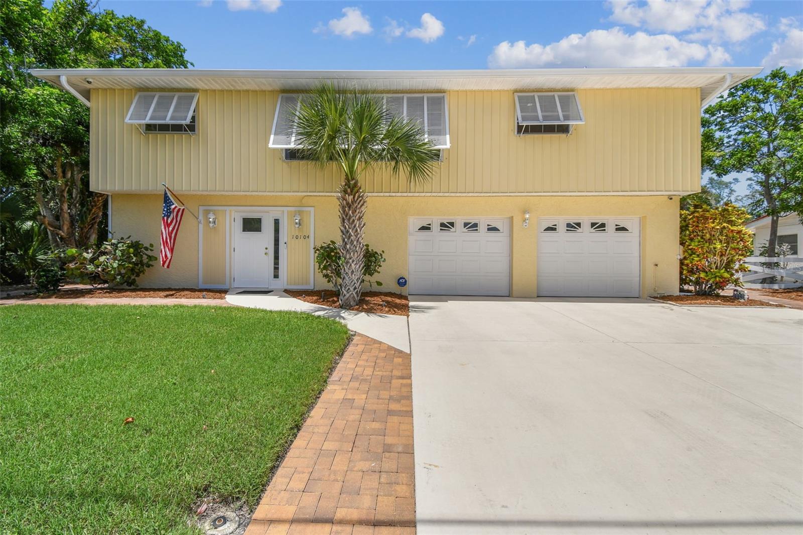WATERFRONT PARADISE IN FLAMINGO CAY - COASTAL LUXURY WITH UNMATCHED VIEWS
Welcome to Flamingo Cay, a coveted canal-front community just minutes from Anna Maria Island and with direct access to Tampa Bay. This stunning Key West-inspired coastal home offers the ideal blend of elegance, functionality, and relaxed Florida living.
The main residence features 3 bedrooms, 2 baths, and 1,472 sq ft of beautifully designed living space, with an additional 1 bed or office, 1 bath nonconforming guest suite—perfect for visitors or multi-generational living.
Step outside and experience true waterfront luxury with an in-ground pool and spa, brand new 10,000 lb remote-controlled boat lift, and breathtaking canal views from your own backyard oasis. Inside, enjoy brand new impact windows, a private elevator, and a 2-car oversized garage with 2 hurricane-rated doors, offering both safety and style.
Set on a 0.017-acre lot, this home is a rare opportunity for luxury buyers seeking a low-maintenance, high-style residence—or investors looking for premium potential in a prime coastal location.
Whether you're boating to the bay, lounging poolside, or soaking in sunset canal views, this property delivers the ultimate Florida lifestyle.