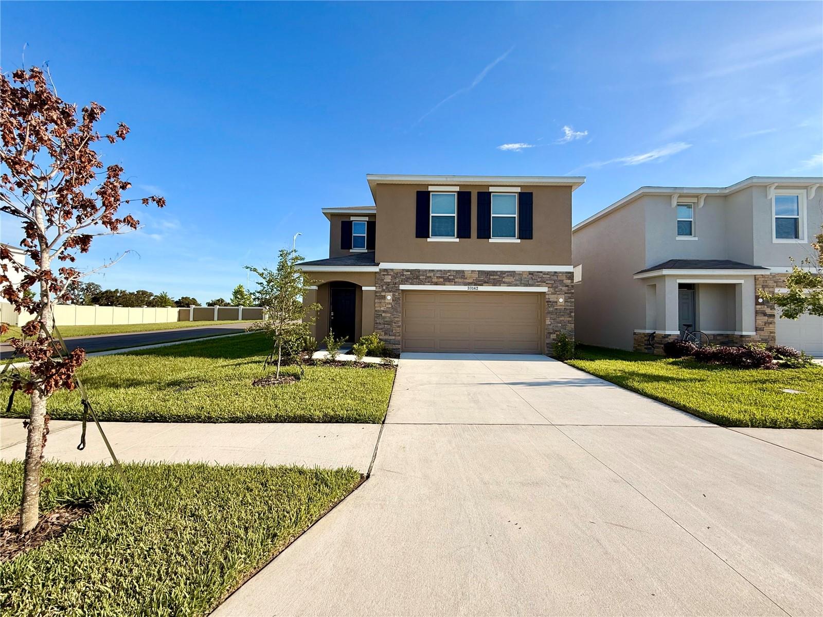 Welcome to this stunning brand-new 4-bedroom, 2.5-bath home in the highly sought-after Mirada community of San Antonio, FL! Featuring a modern open-concept layout, an upstairs loft, and a full appliance package—including washer and dryer—this two-story home is move-in ready. Enjoy added privacy on a corner lot with no rear neighbors and included cable and high-speed internet. Live the resort lifestyle with exclusive Lagoon access, scenic walking trails, and dog parks just steps from your door. Conveniently located near I-75, Publix, shopping, dining, and the Tampa Premium Outlets, this home offers the perfect balance of comfort, convenience, and community. Don’t miss the chance to make this Mirada gem yours—schedule your showing today!